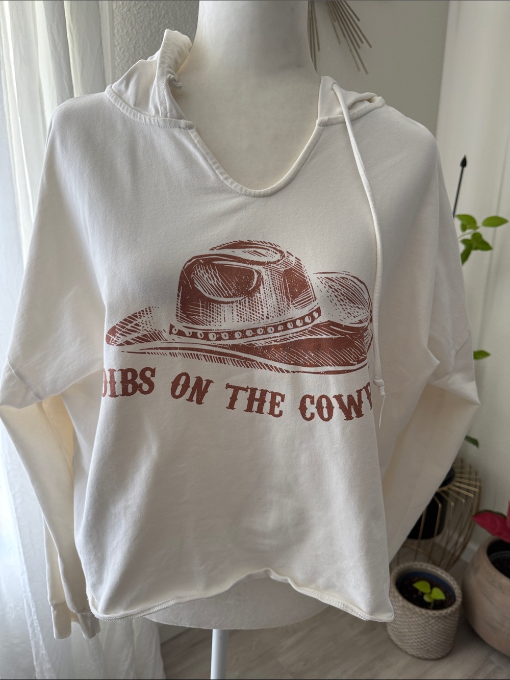 Cream Hoodie Top with Brown Western Hat Print.